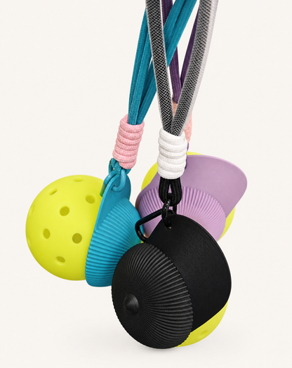 RallyWell pickleball cap keychain with ball in blue purple and black
