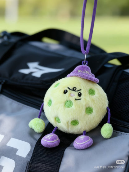 Pickleball bag charm clipped to sports bag